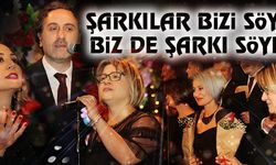 ŞARKILAR BİZİ SÖYLER