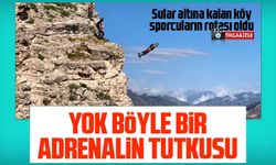 Sular altına kalan köye paraşütle atladılar