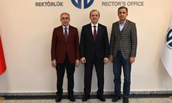 YÖK Üyesi Prof. Dr. Hüseyin Karaman, KTÜ Rektörü Prof. Dr. Hamdullah Çuvalcı'yı Ziyaret Etti