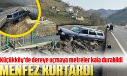 Trabzon Çarşıbaşı'nda Tehlikeli Trafik Kazası: Kontrolden Çıkan Araç Dereye Düşmekten Son Anda Kurtuldu