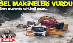 Artvin’de dere sularına yakalanan iş makineleri son anda kurtarıldı