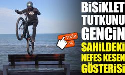 Bisiklet tutkunu gencin sahildeki nefes kesen gösterisi sosyal medyada gündem oldu