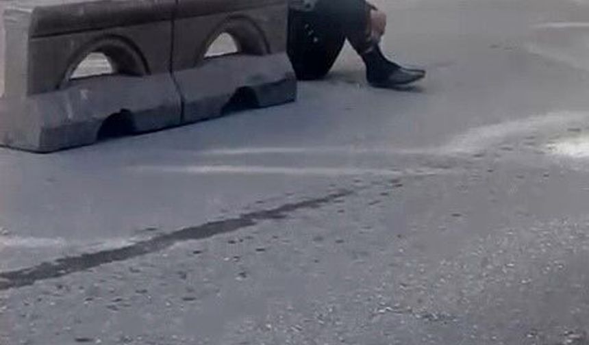 Sokak ortasında hareketsiz duran şahıs tedirginliğe yol açtı